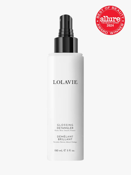 Detangler in branded white bottle with black spray pump on light gray background with red and white 2024 allure best of beauty seal